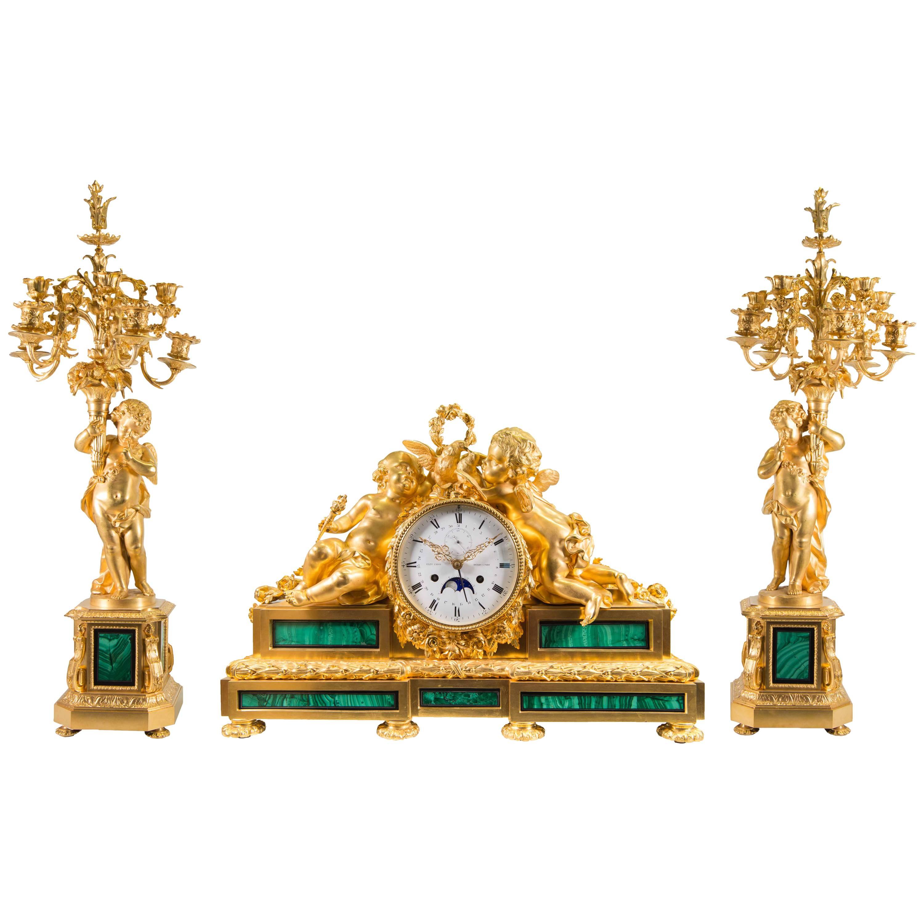 Louis XVI Style Garniture with Malachite, Moonphase, and date, Bourdain à Paris For Sale