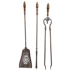 Three-Piece Set of Polished Steel Fireplace Tools with Brass Finials