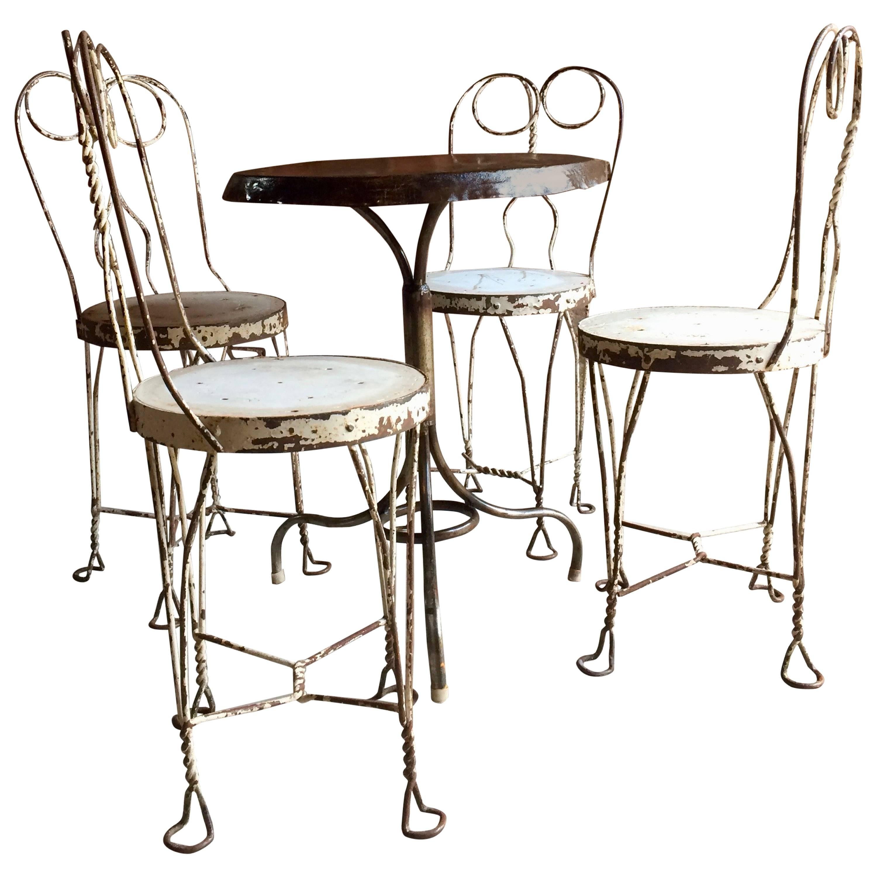 French Bistro Table and Four Chairs Original Wrought Iron, circa 1920s