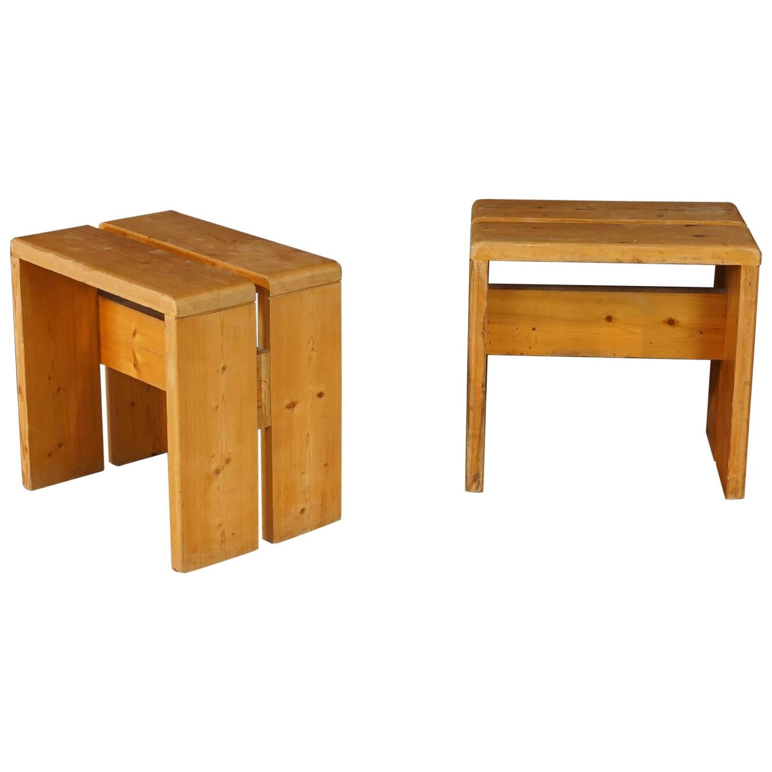 Set of rare stools designed by Charlotte Perriand for Les Arcs ski resort in France, circa 1960. Set comprises of two pairs in two very similar models.