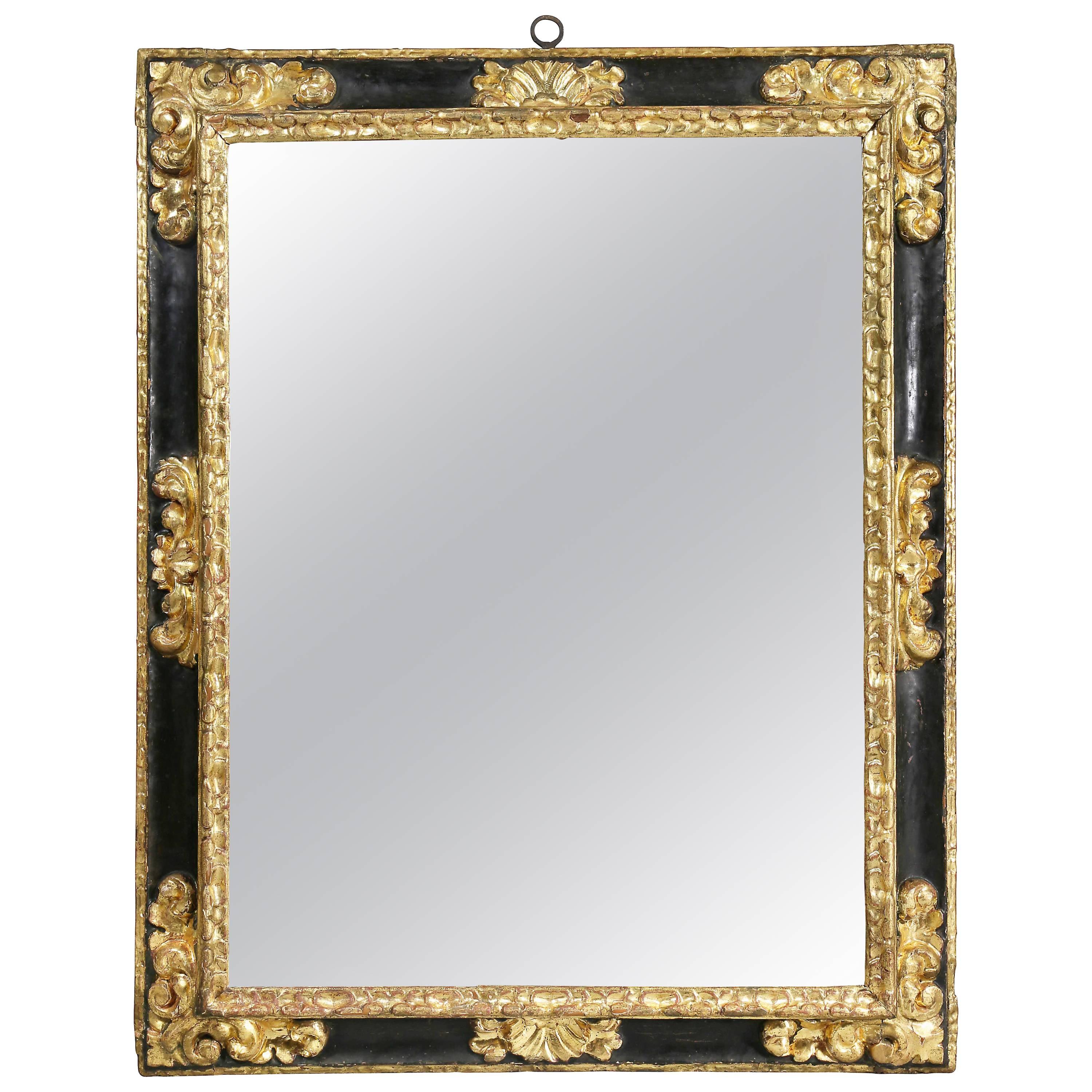 Spanish Baroque Ebonized and Giltwood Mirror