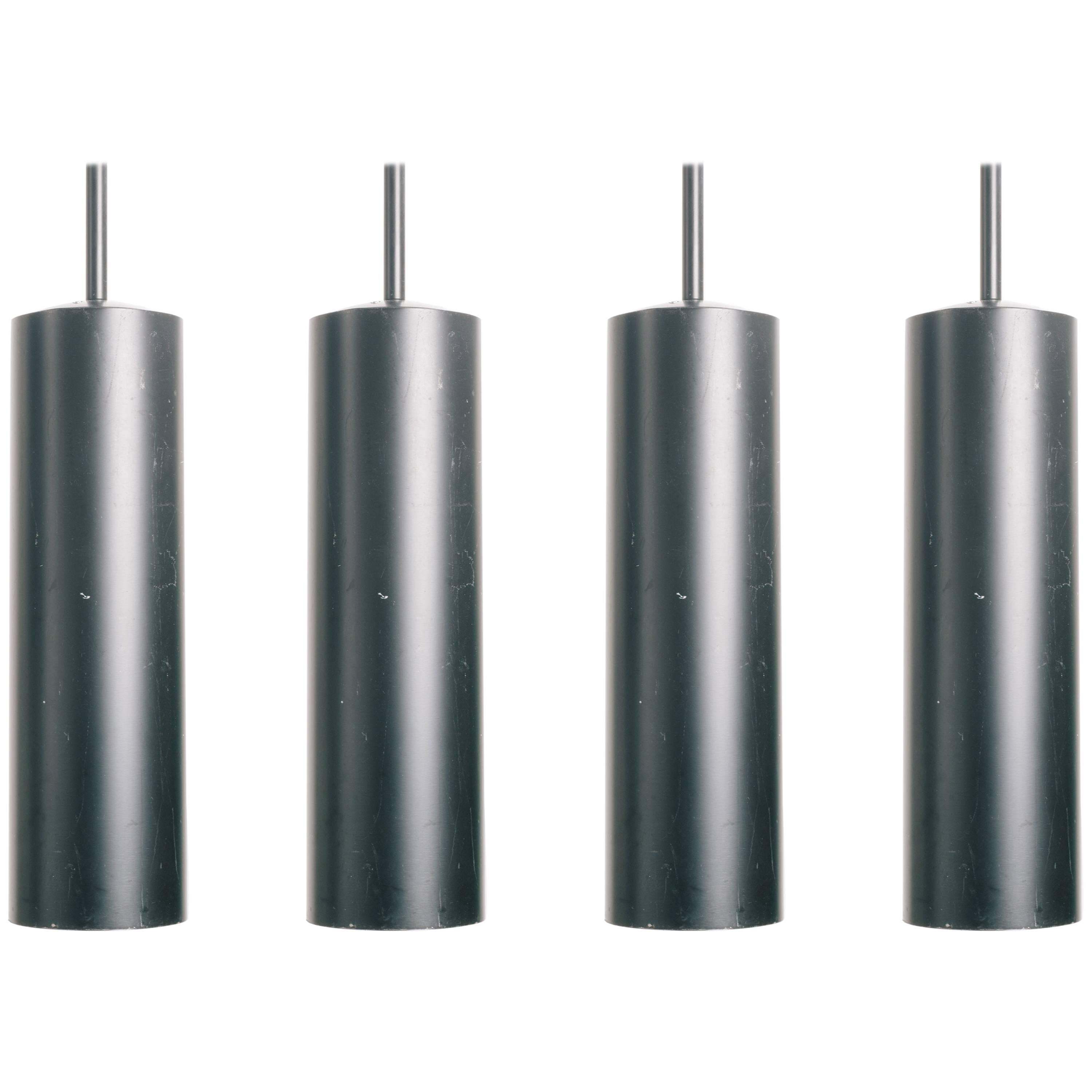 Four 1980s Steel Tubular Pendants