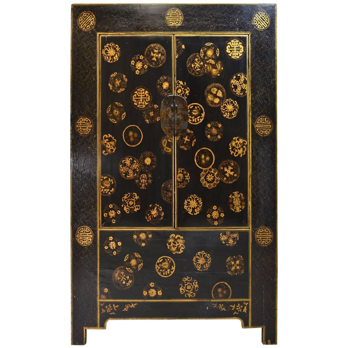 Chinese Qing Cabinet with Black Lacquer 
Gold Painted Embellishments