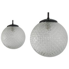 Pair of Midcentury Glass and Bakelite Holophane Globe Pendant Lights