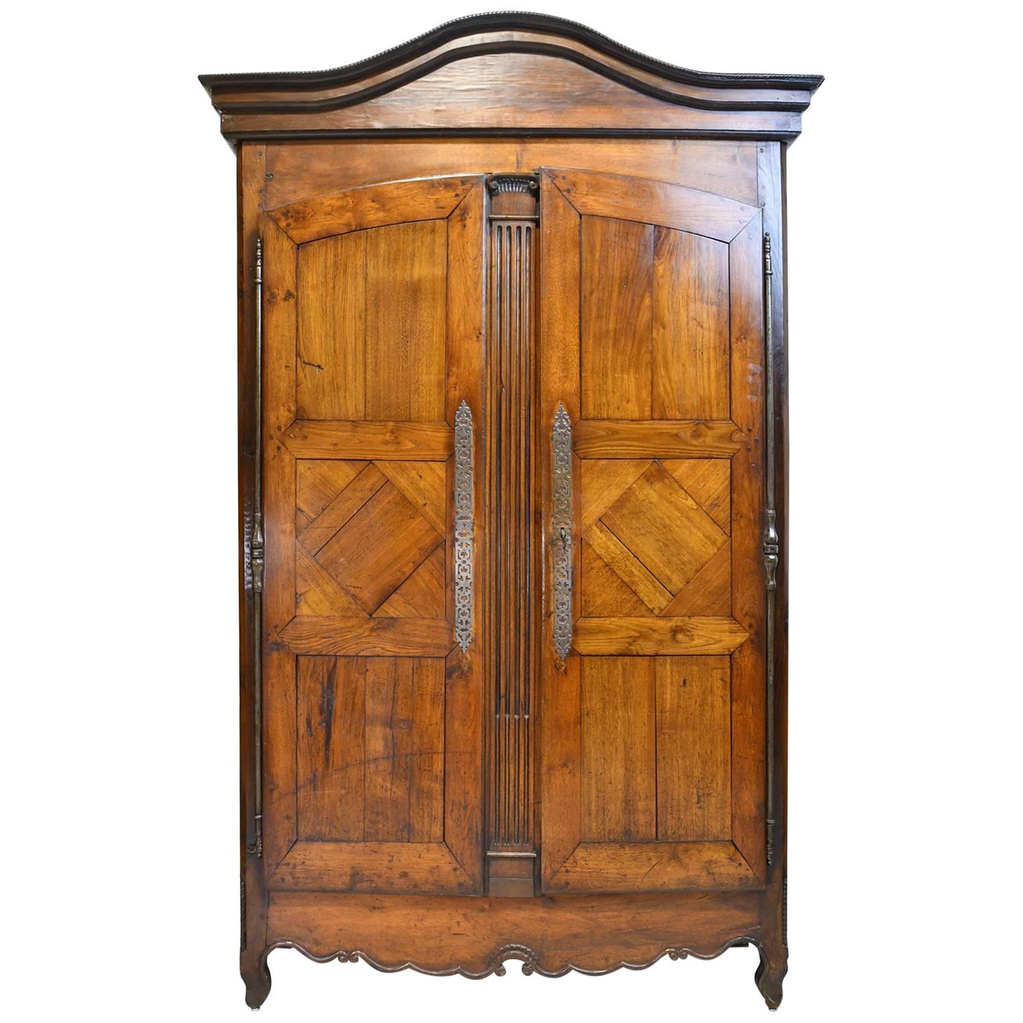 18th Century Country French Armoire in Walnut with Arched Bonnet For Sale