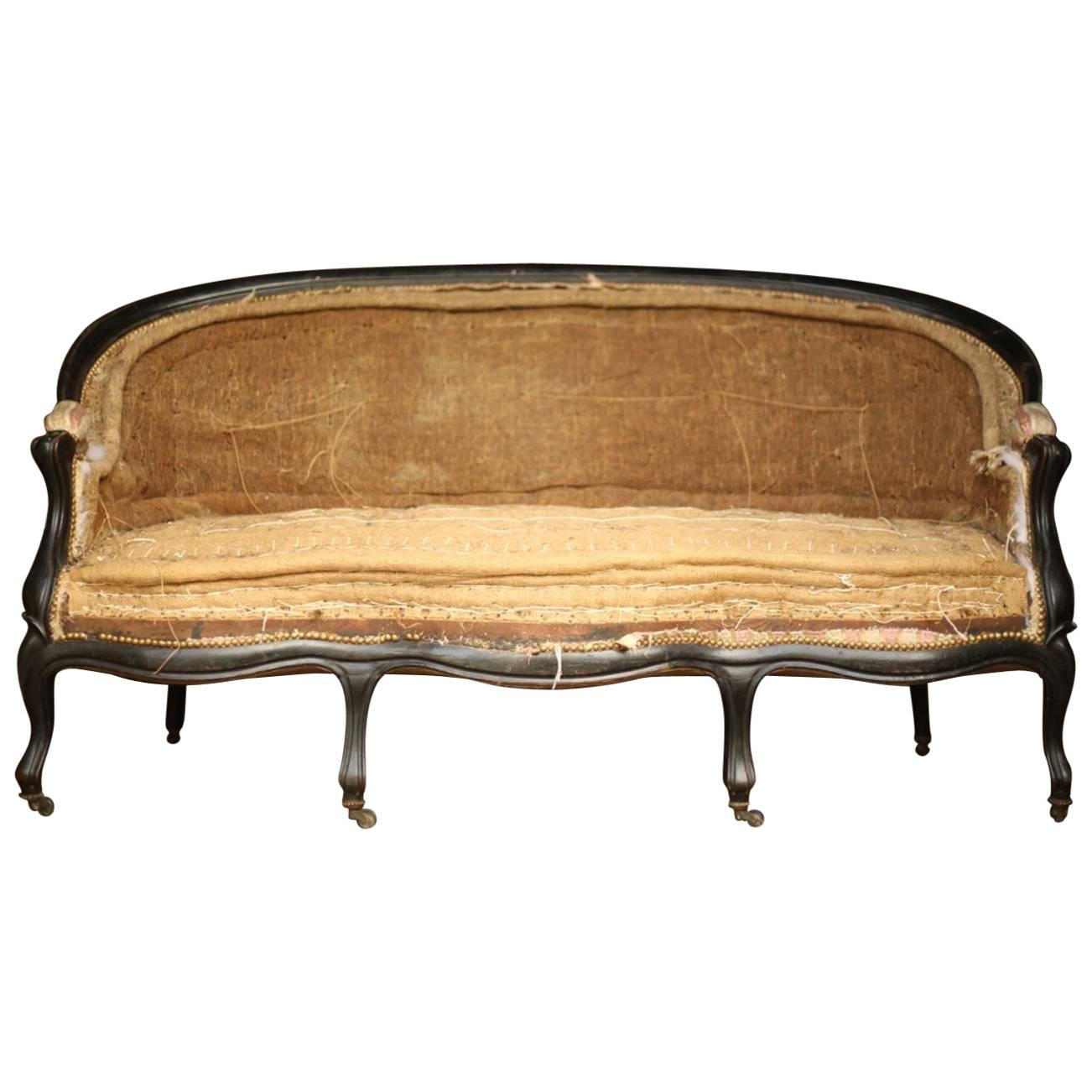 19th Century Napoleon III Ebonized Six Legged Sofa