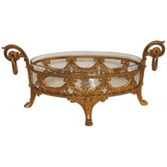 Bol ovale centre de table en cristal bronze doré avec nœuds en bronze doré et pieds en forme de pattes de fougère filigranes