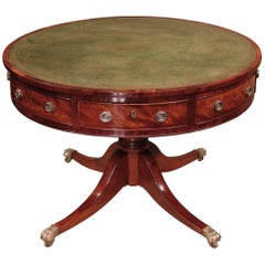 Early 19th century mahogany drum table with green leather revolving top