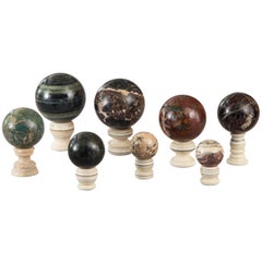 Set of Eight Specimen Marble Spheres on Stands