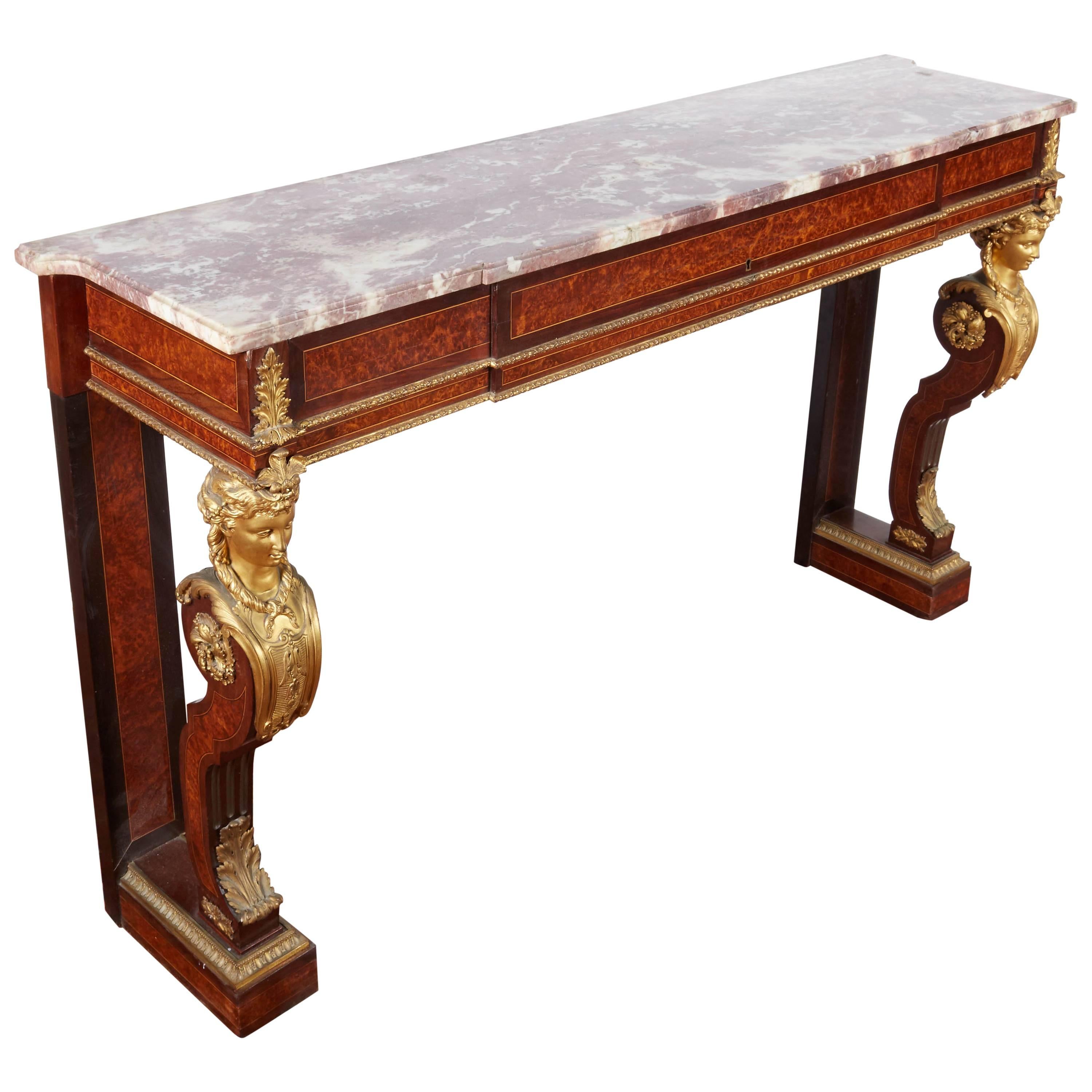 An exquisite French ormolu-mounted console table with marble top, 

19th century.

Very high quality mounts, with original marble top.

Measures: 32