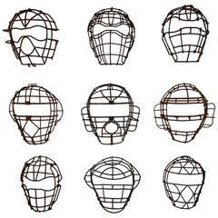 Collection of Nine Antique Steel Catchers Masks, circa 1920-1950