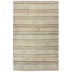 Vintage Kilim Rug with Neutral Stripes and Geometric Tribal Motifs from Turkey