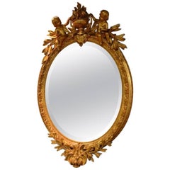 19th Century French Giltwood Oval Crystal Mirror with Rich Decoration