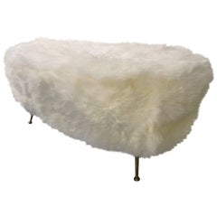 Large bench with fur and brass feet