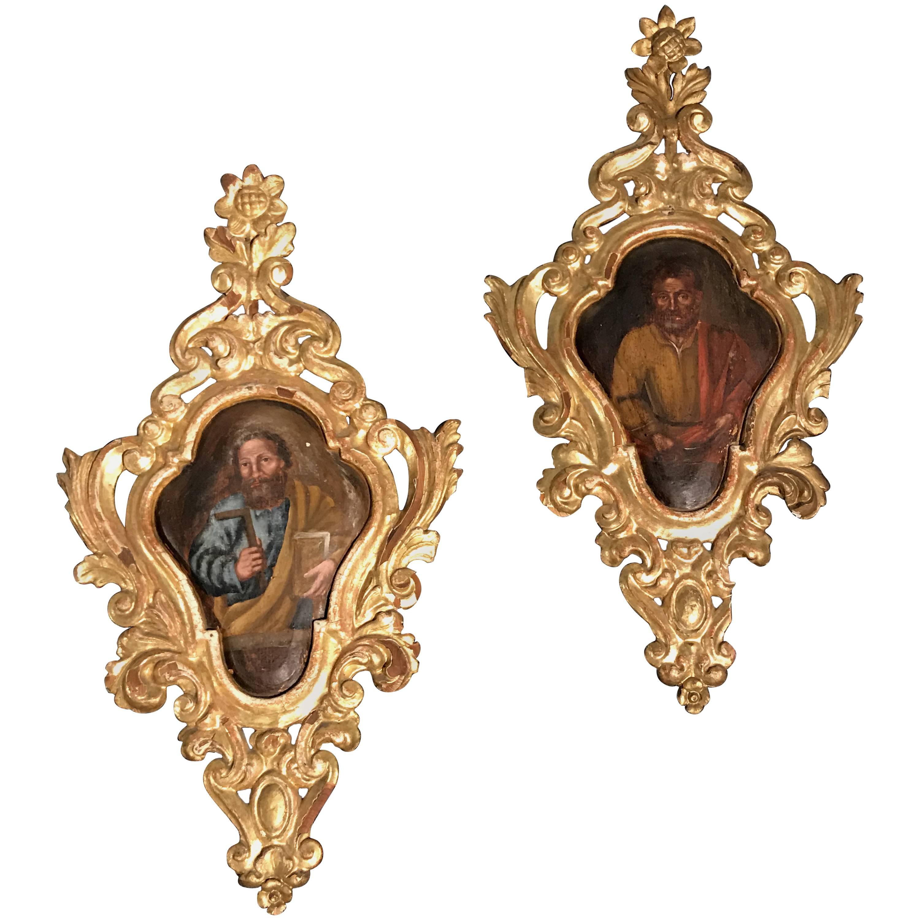 Pair of Continental Baroque Style Painted Giltwood Panels Depicting Saints For Sale