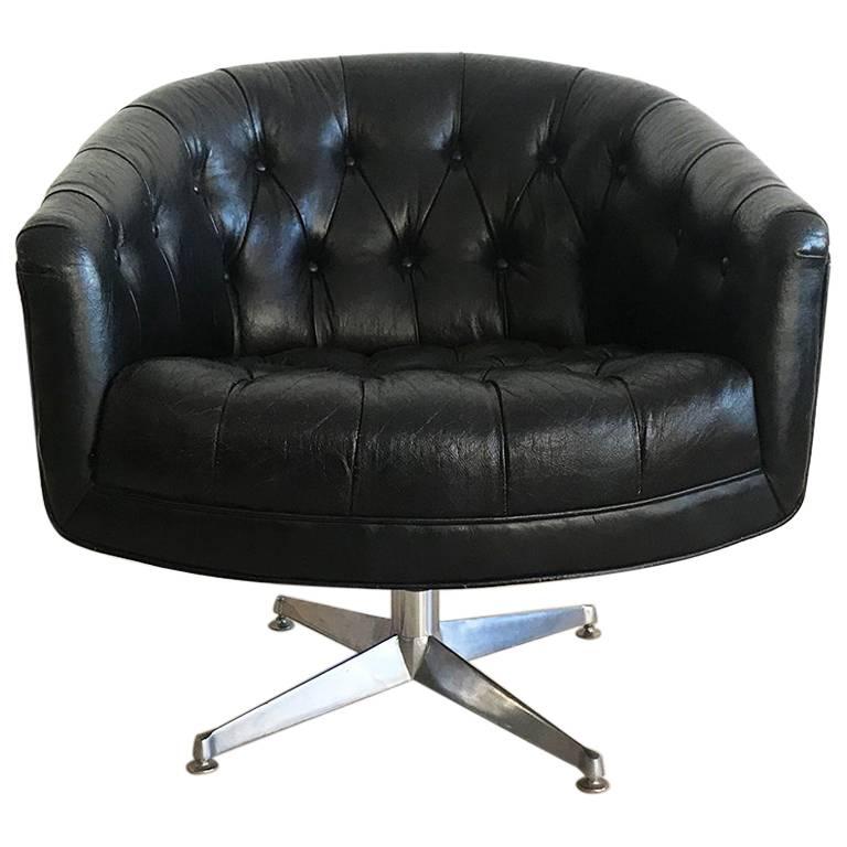 Ward Tufted Black Leather Swivel Club Chair at 1stdibs