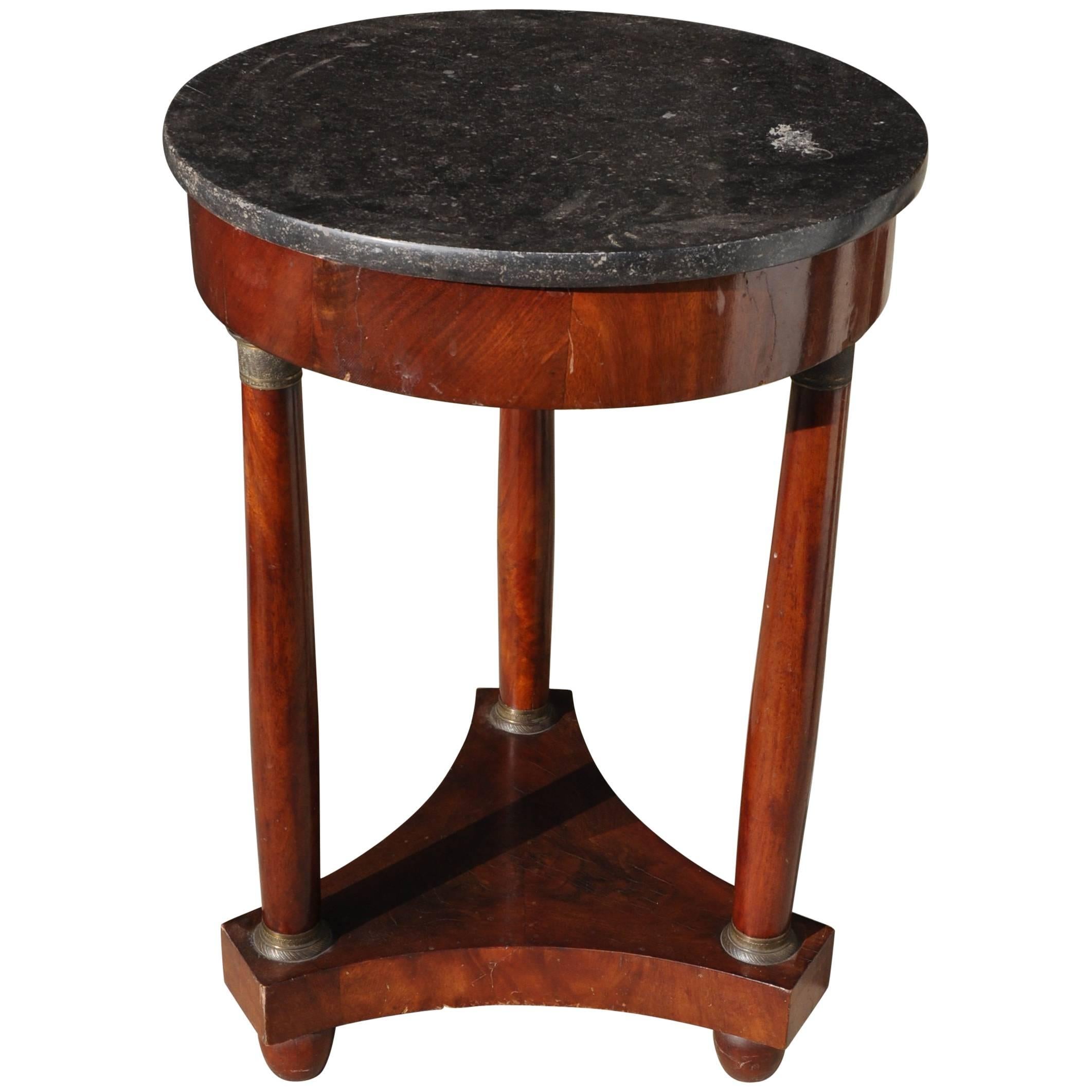 XIX Round Coffee Table in Empire Style with Three Legs and a Black Marble Top For Sale