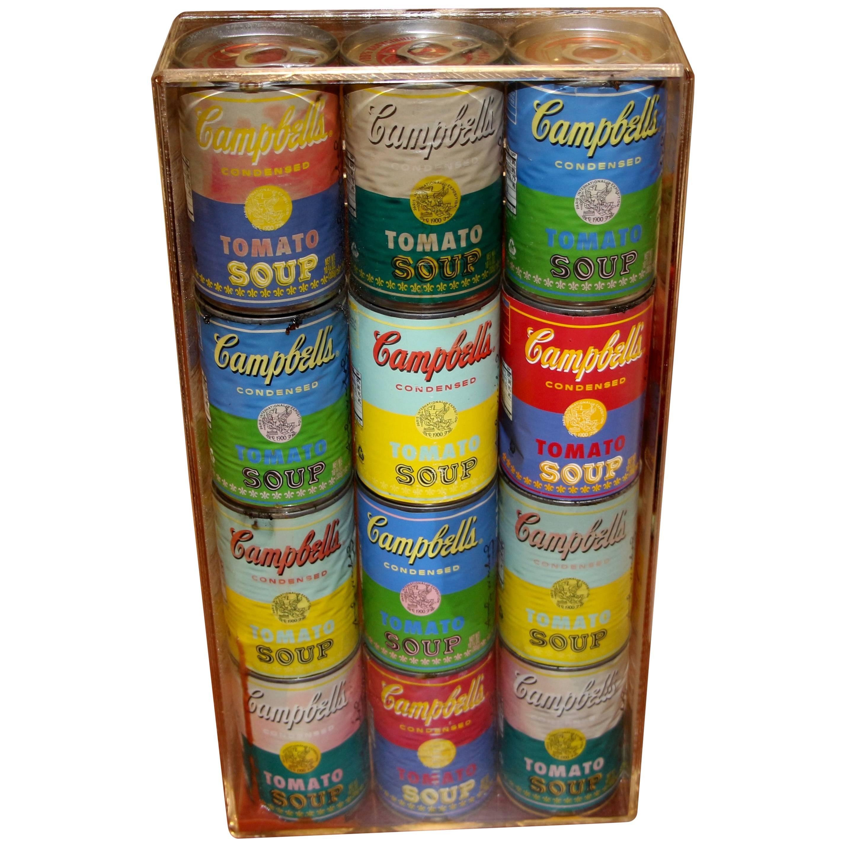 12 Andy Warhol Campbell Soup Cans in a Lucite Box
