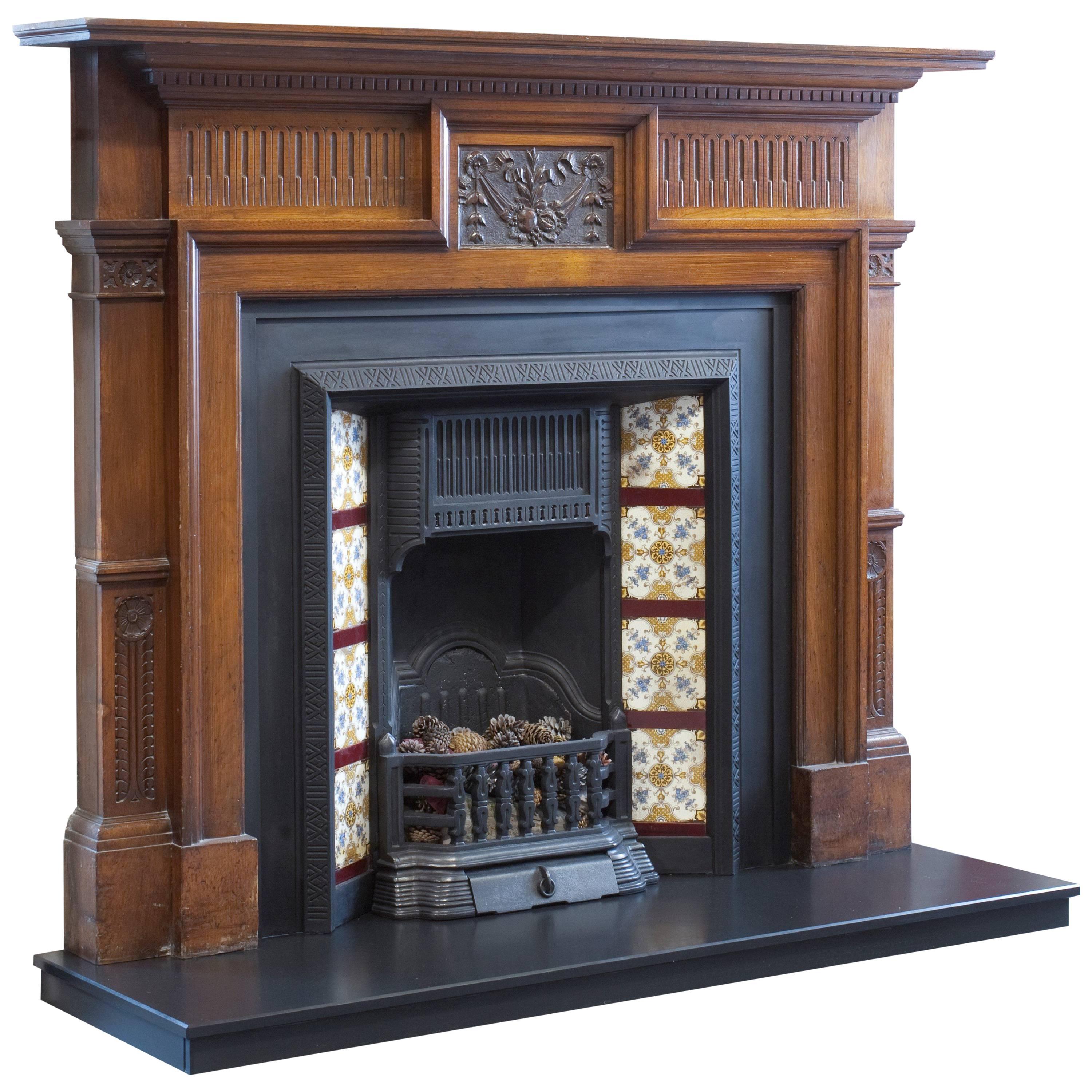 Irish Early 20th Century Edwardian Hand-Carved Walnut Fireplace Surround For Sale