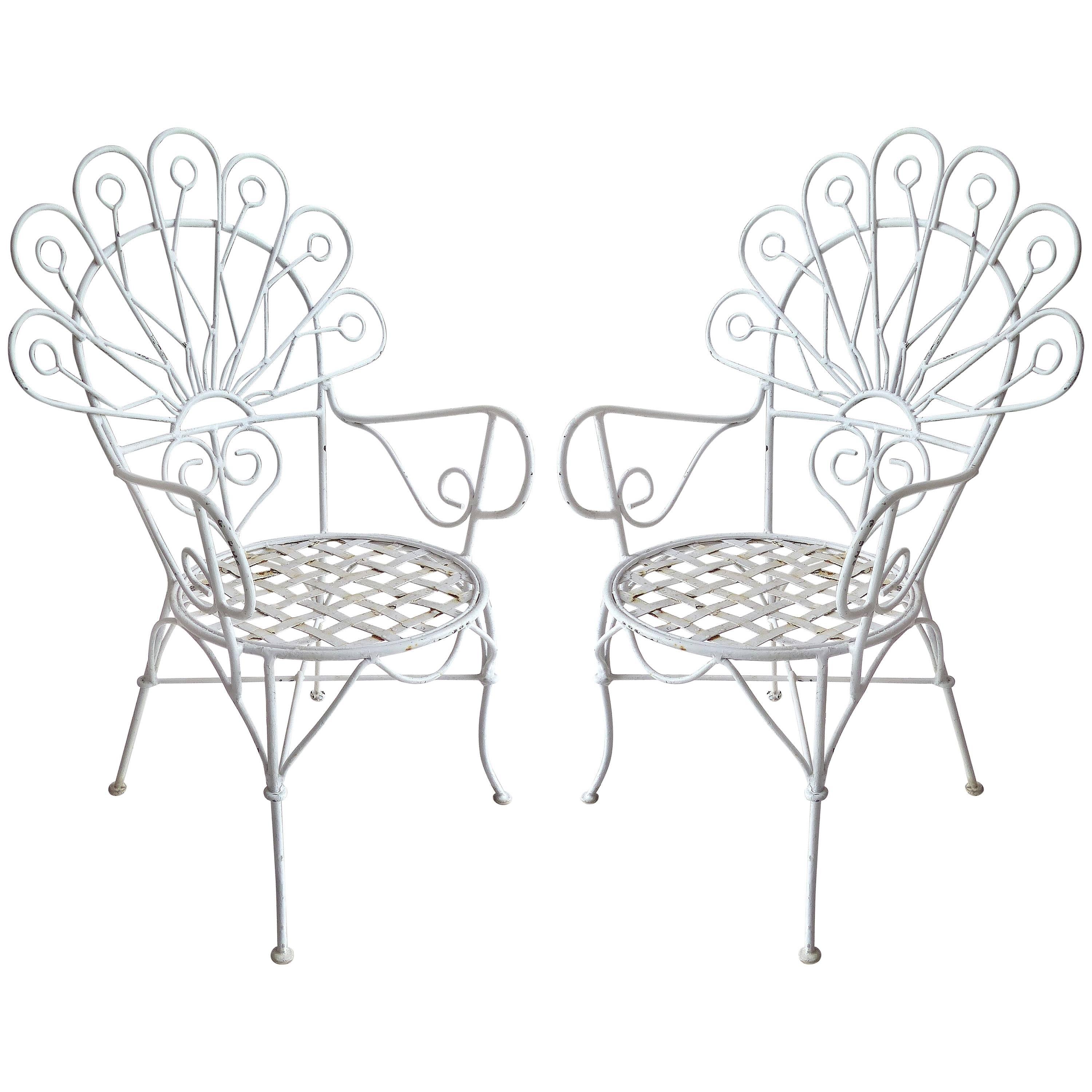 Pair of Whimsical 1940s Hollywood Regency "Peacock" Painted Iron Garden Chairs