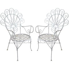 Pair of Whimsical 1940s Hollywood Regency "Peacock" Painted Iron Garden Chairs