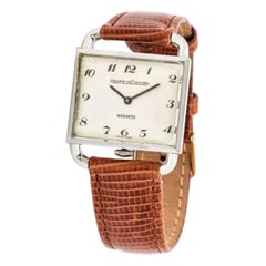 An Hermes Watch With Lizzard Band.
