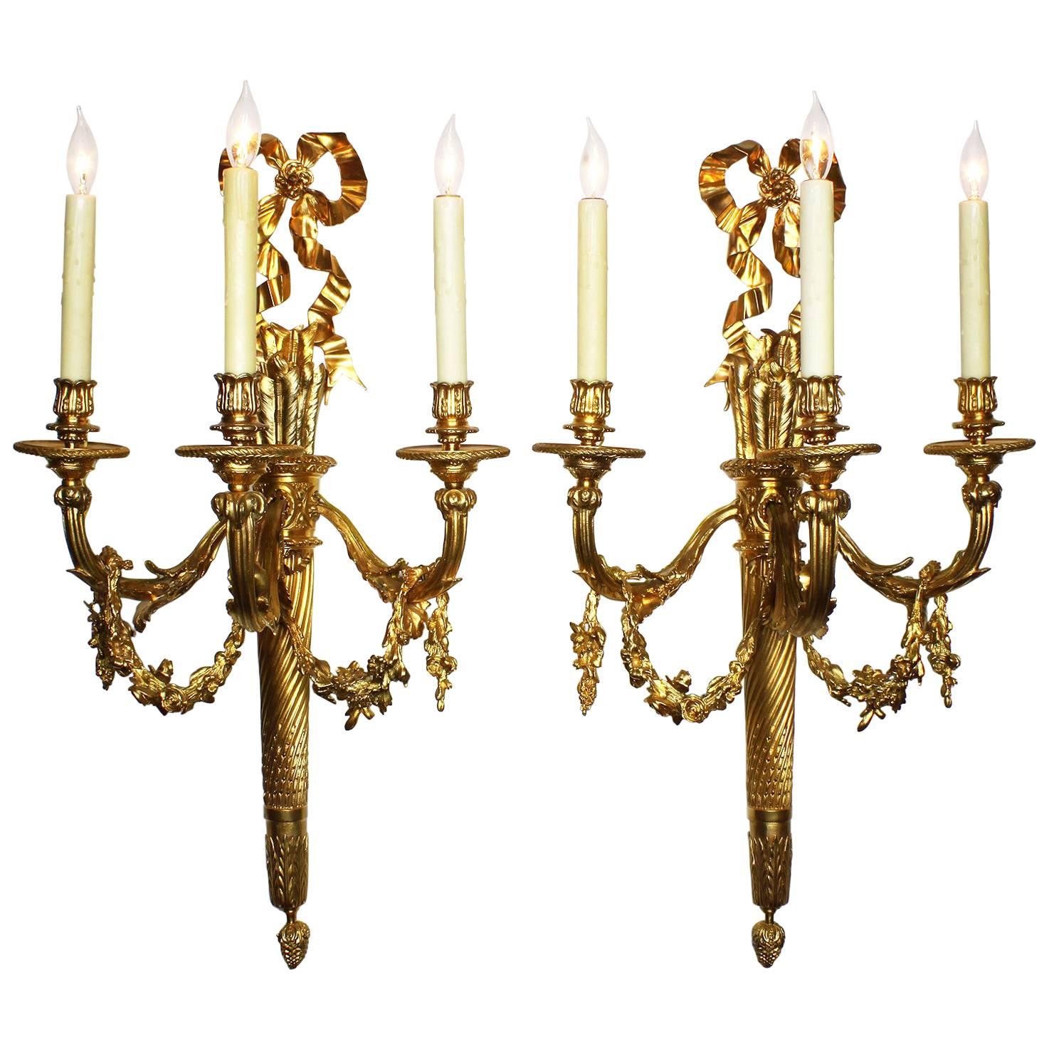 Pair of French 19th-20th Century Louis XVI Style Gilt-Bronze Torch Wall Sconces