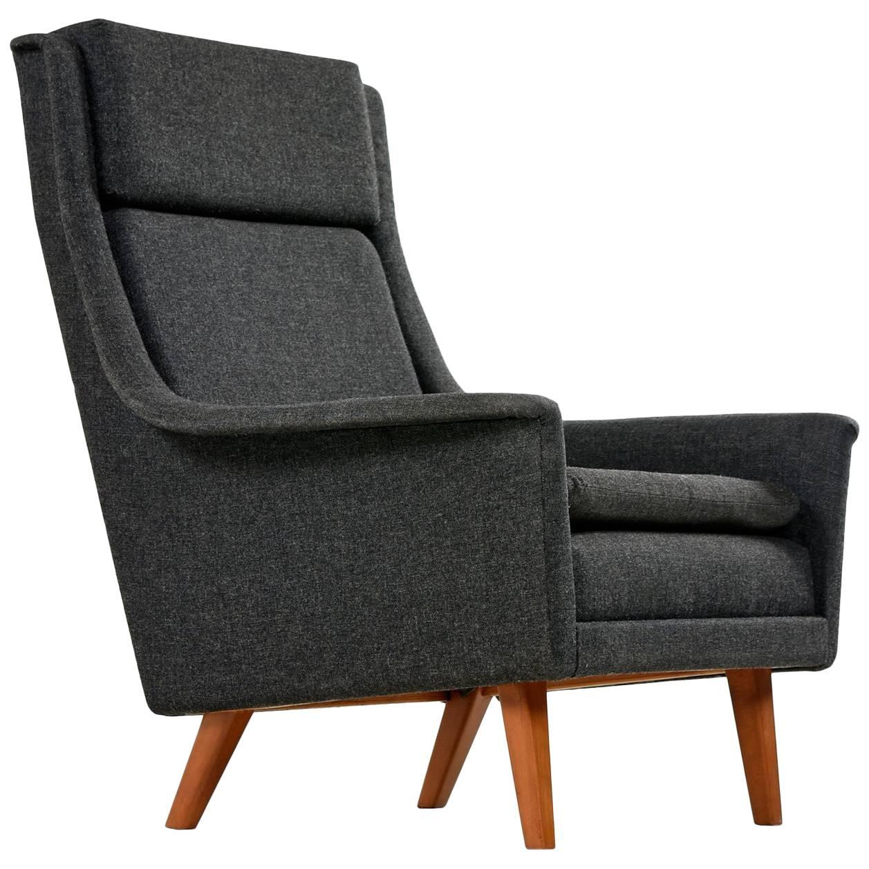 Exceptional, all original condition except for new decking upholstery and new foam seat cushion. The dark grey fabric is as stylish and fashionable now as it was in the 1960s. Segmented, separate back and head rest cushions create a masculine, yet