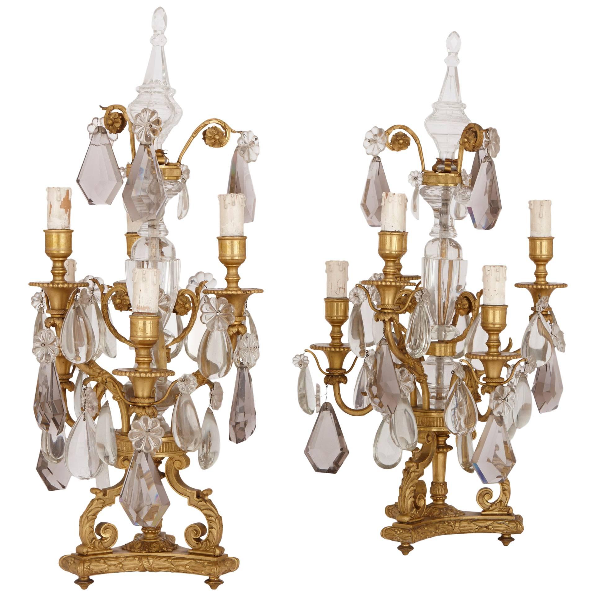 Paire de candélabres français anciens du XIXe siècle en bronze doré et cristal