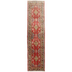 Antique Khotan Runner from Turkestan with Geometric Medallions in Red Background
