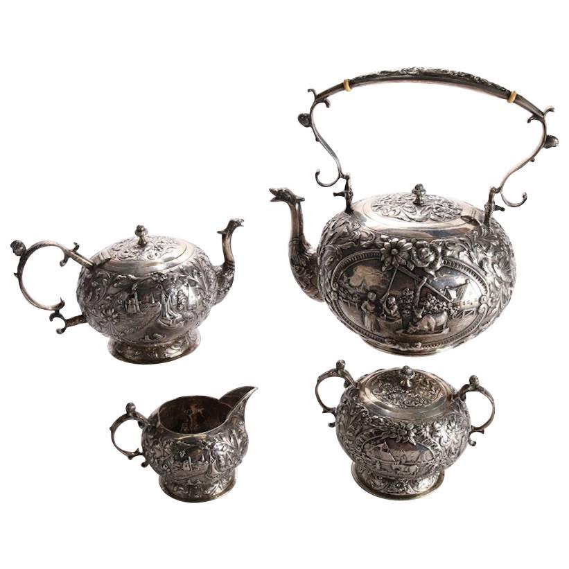 Four-Piece Antique Dutch .800 Silver Repousse Figural and Scenic Tea Set