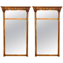 Pair of Gilt Gold Wall or Console Mirrors with Column Form Sides and Carved Tops
