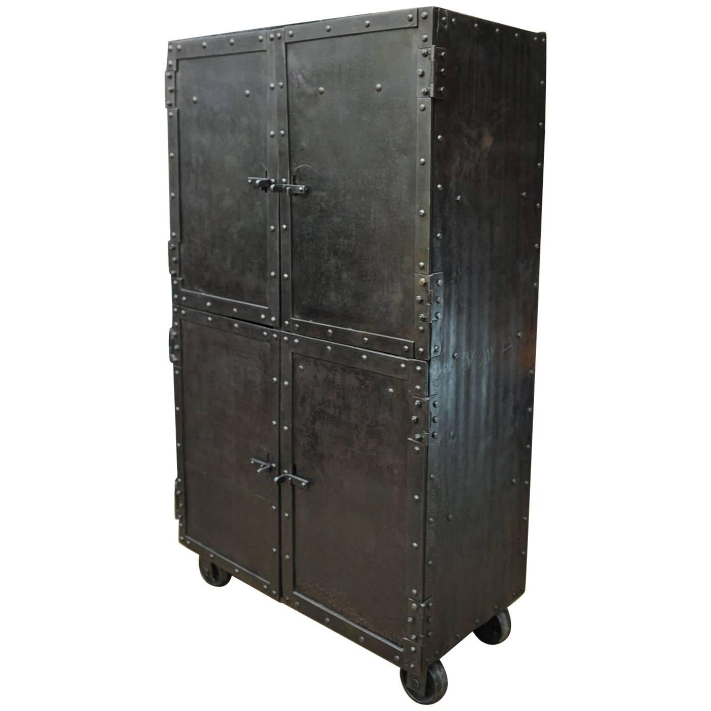 Exceptional Four-Doors Industrial Riveted Iron Cabinet on Wheels, circa 1900