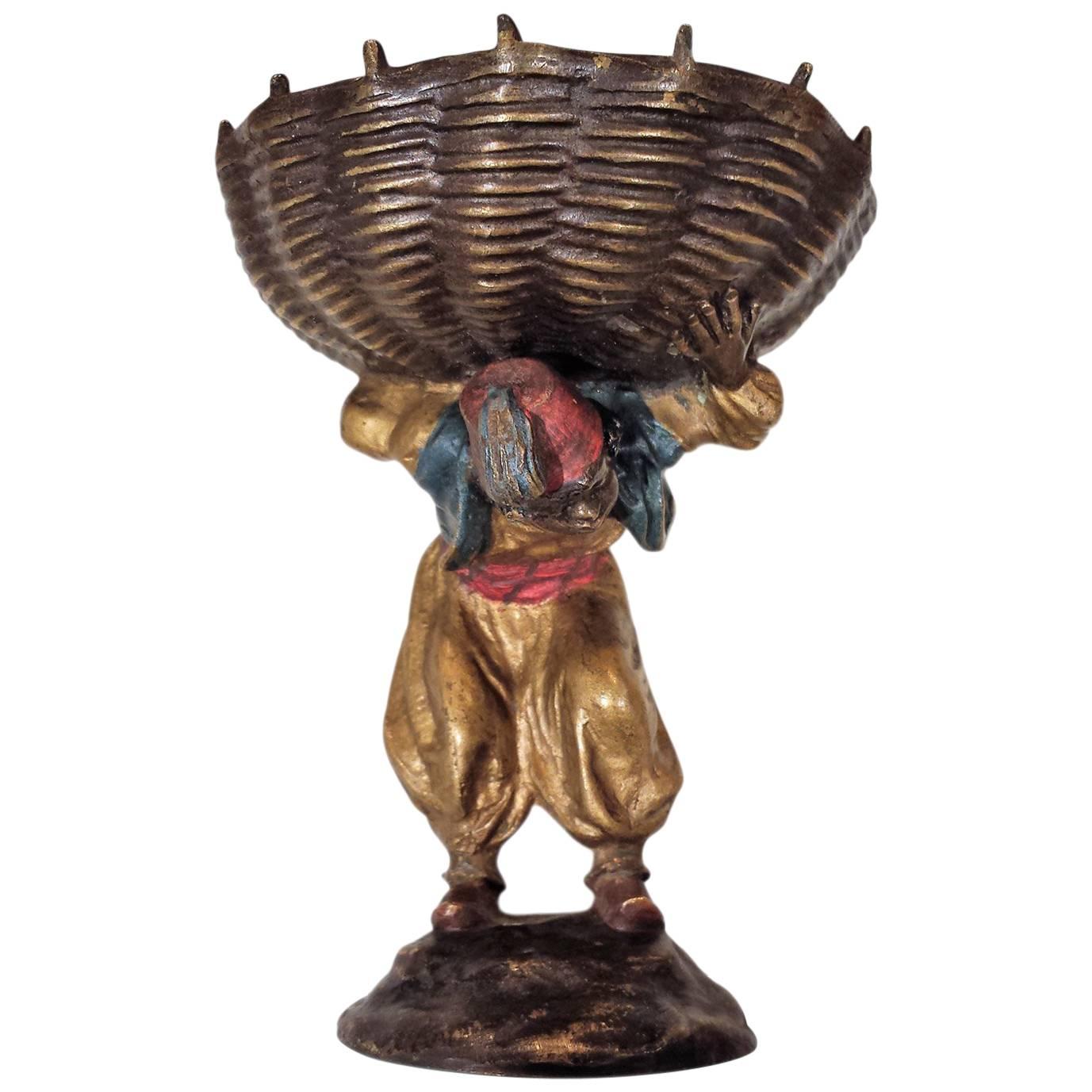 Boy Carrying a Basket a Bronze Sculpture by Franz Bergman For Sale