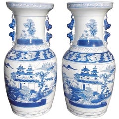 Pair of Chinese Porcelain Glazed Foo Dog and Pagoda Temple Jars, 20th Century