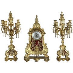 Antique Napoleon III Gilt Bronze and Varnished Wood Clock and Pair of Candelabra