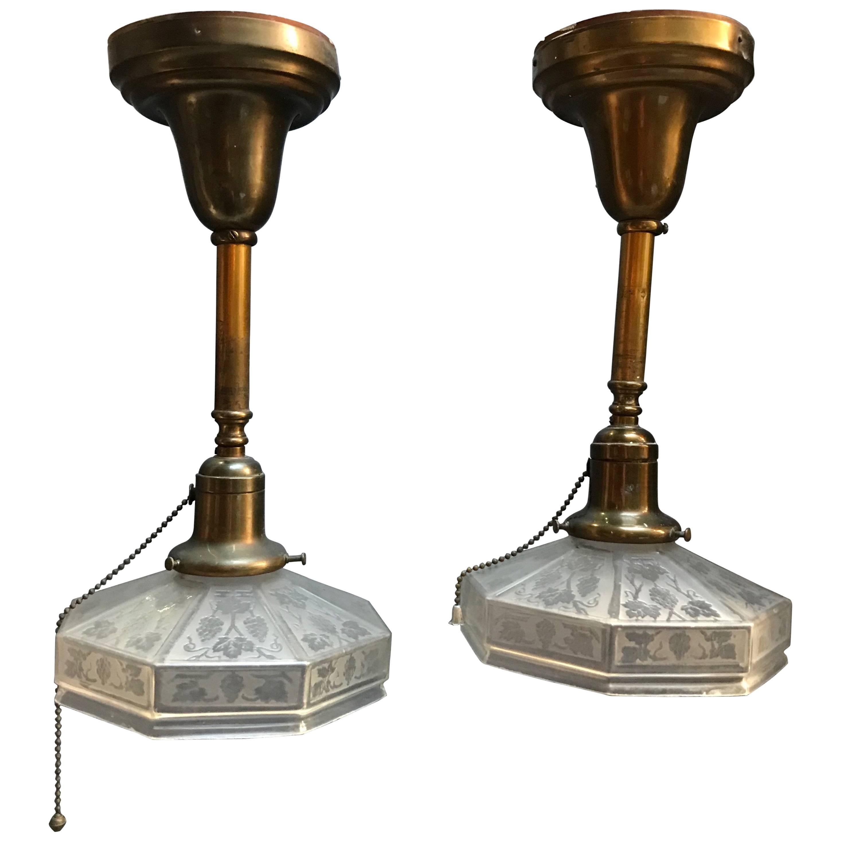 Pair of Industrial Etched Octagonal Glass Pendant Lights on Brass Poles For Sale
