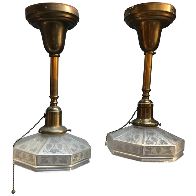 Pair of Industrial Etched Octagonal Glass Pendant Lights on Brass Poles For Sale