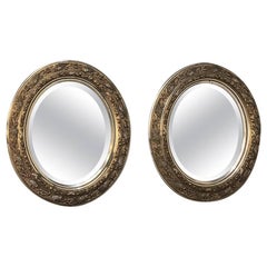 Pair of Antique French, Louis XVI Oval Beveled Mirrors