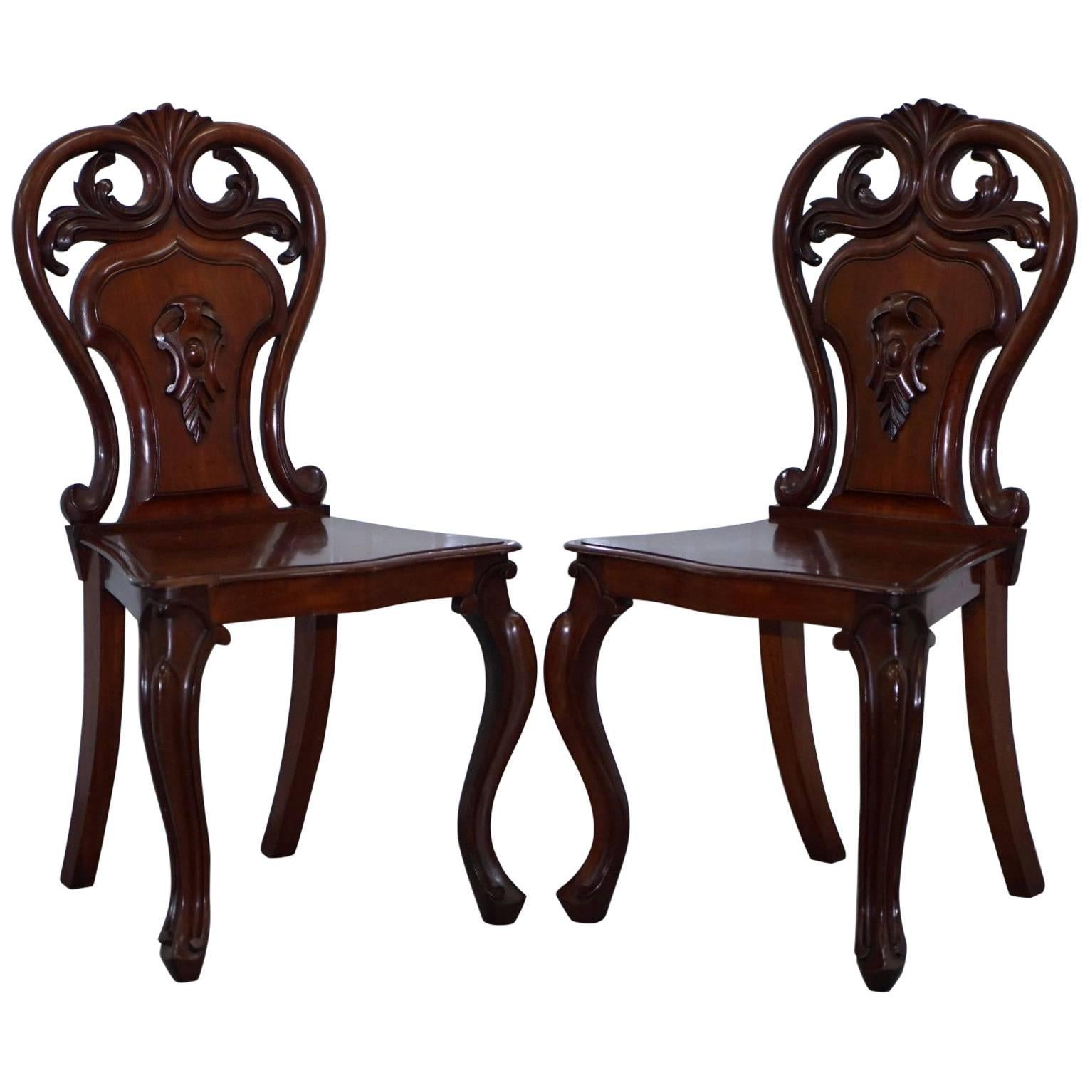 Pair of Rare 1870 Victorian Hand-Carved Shield Backed Solid Mahogany Hall Chairs