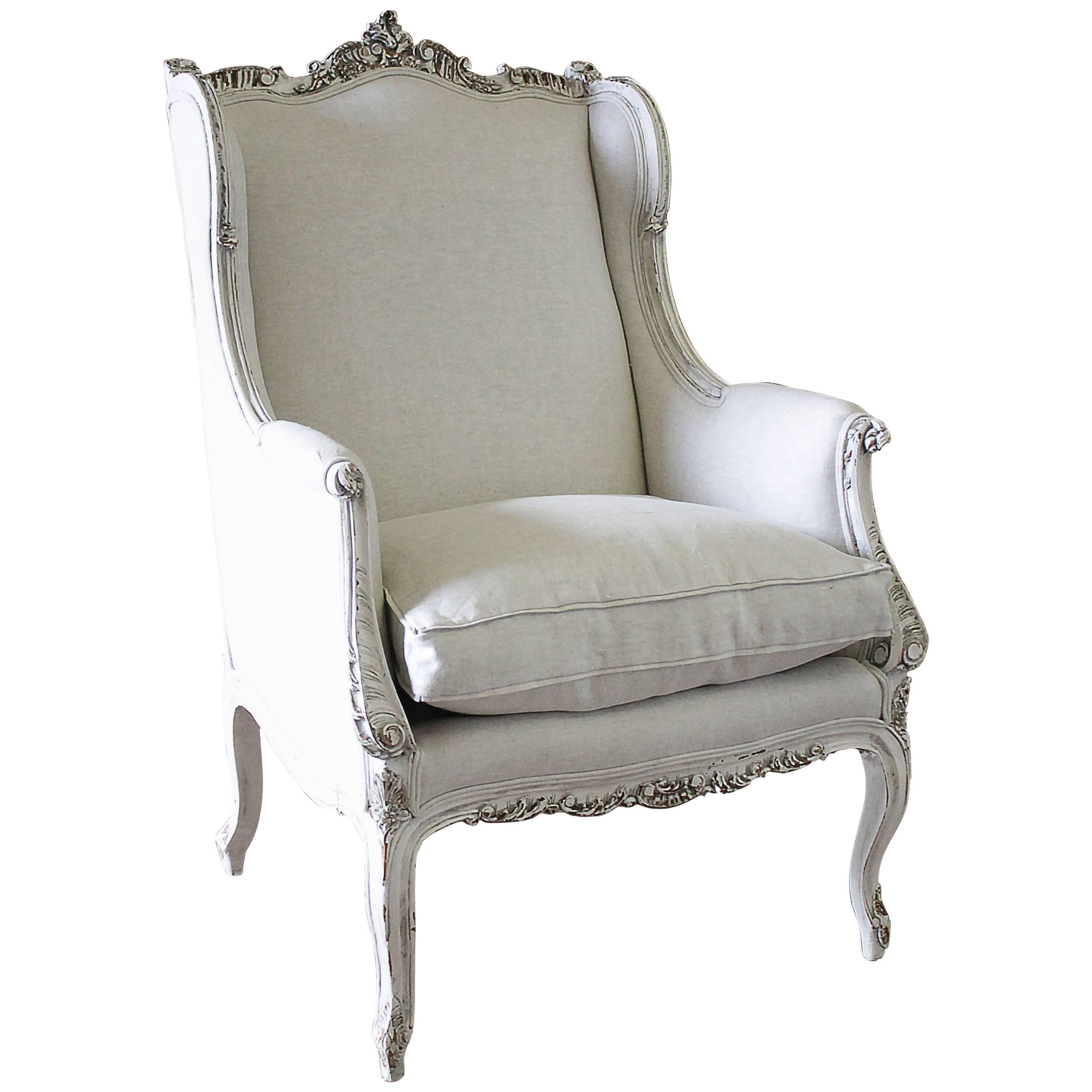 19th Century Carved and Painted Louis XV Style Wing Chair Upholstered in Linen