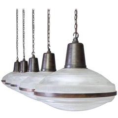 Five Large Holophane Pendant Lights