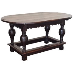 Flemish Carved Turned and Shaped Dark Oak Oval Table, Early 17th Century