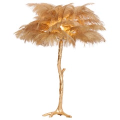 Lampe d'arbre à plumes dorée