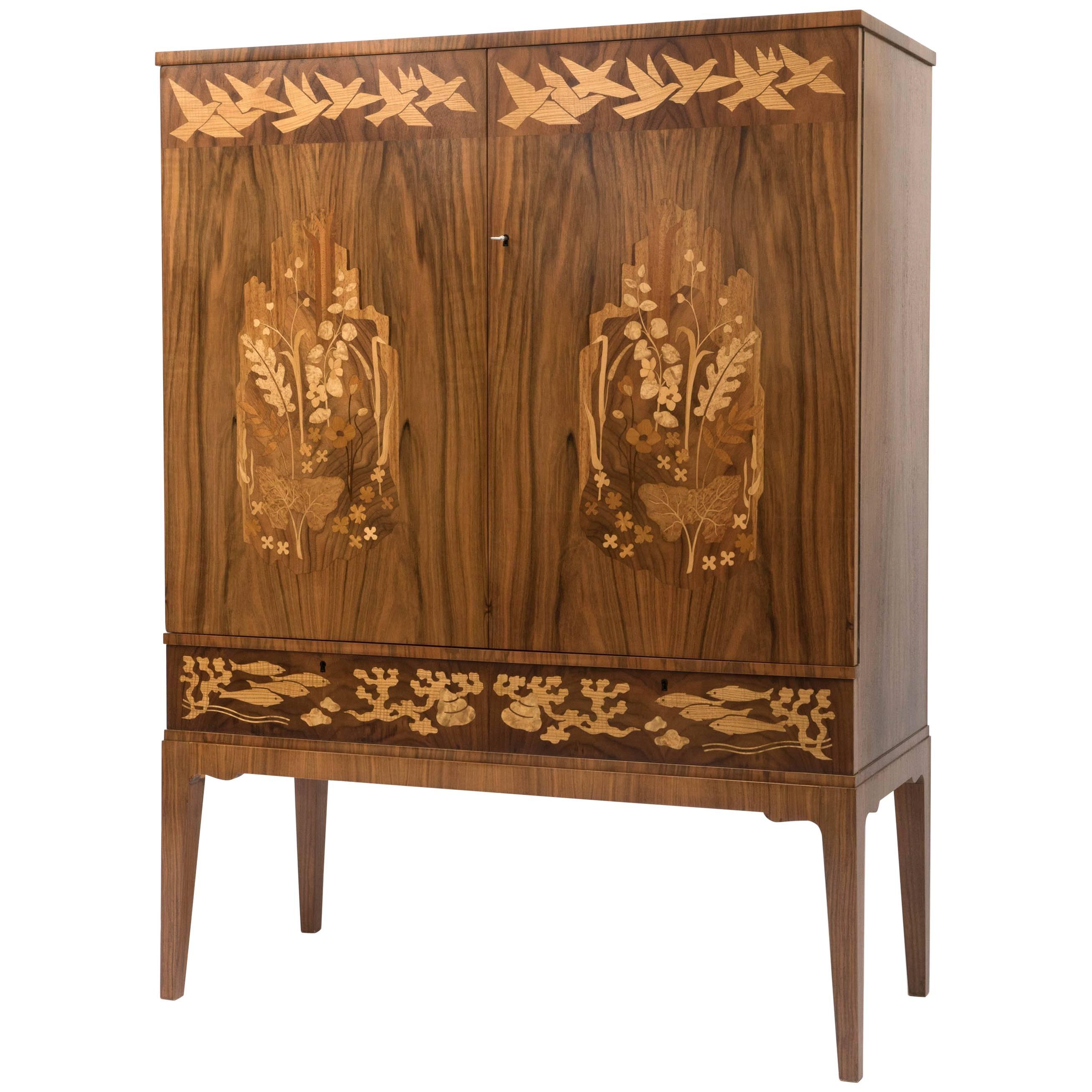 Erik Mattsson mahogany cabinet with various exotic wood inlay, Sweden circa 1940