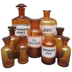 Antique Collection of Nine Belgian Amber Glass Apothecary Bottles, circa 1890