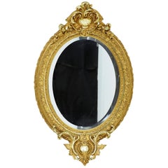 19th Century Carved Burnished Gilt Oval Mirror