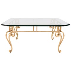 Mesa de centro de hierro dorado con tapa de cristal Hollywood Regency Mid Century Modern