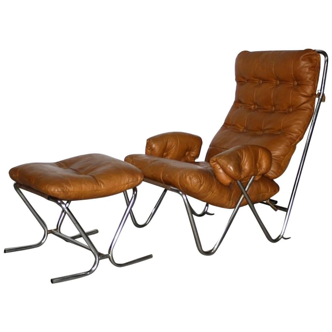 Midcentury Cognac Leather and Tubular Chrome Lounge Chair with Ottoman For Sale