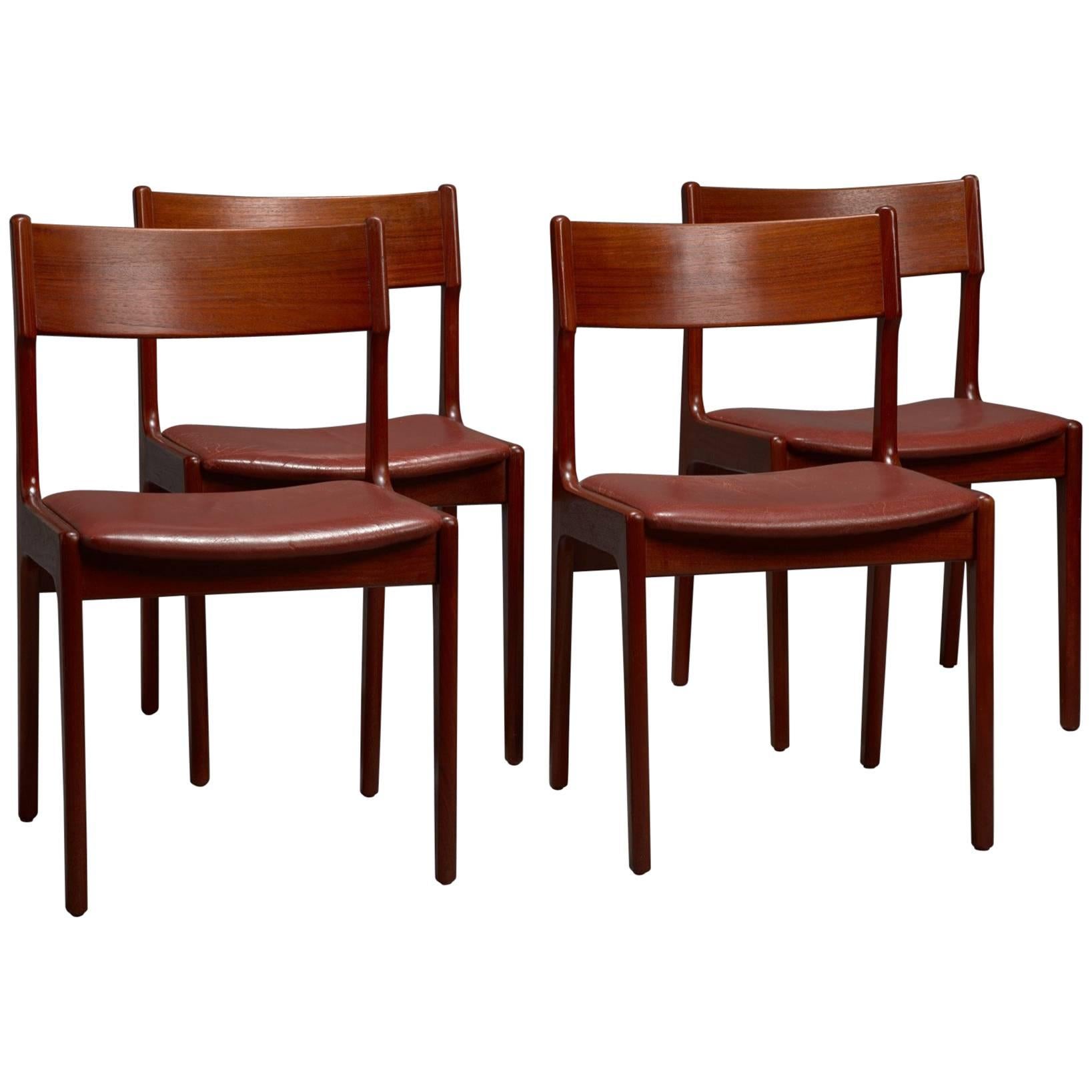 Set of Four Danish Teak and Leather Dining Chairs